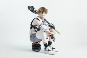 NH lacrosse team & player photography by Leatherhead Sports Media. LAX youth player.