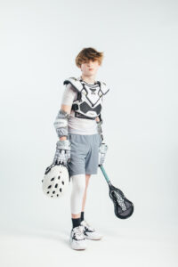 NH lacrosse team & player photography by Leatherhead Sports Media. LAX youth player.