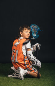 Abenaki Youth Lacrosse, Wolfeboro, NH. New Hampshire team and player sports photography by Leatherhead Sports Media. LAX